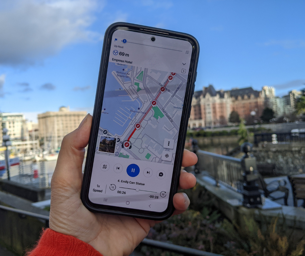 image of a phone showing a self-guided route on the screen